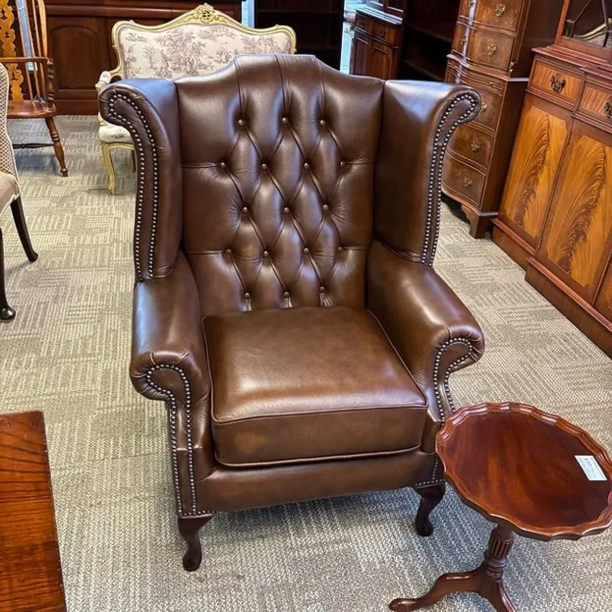 Queen Anne high back leather Chesterfield arm chai