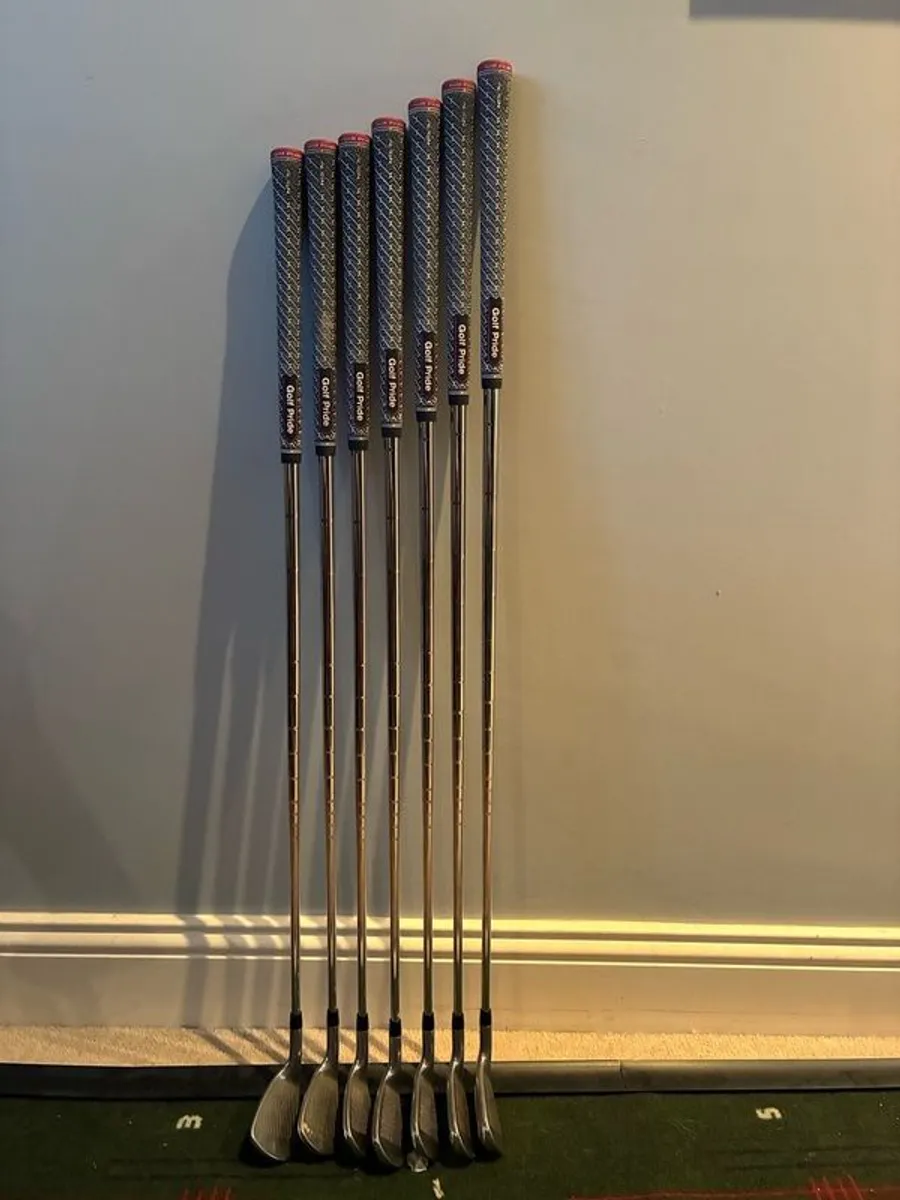 Titleist T300 Irons; 5 to GW; AMT Black Stiff; New Mid Size Grips - Image 1