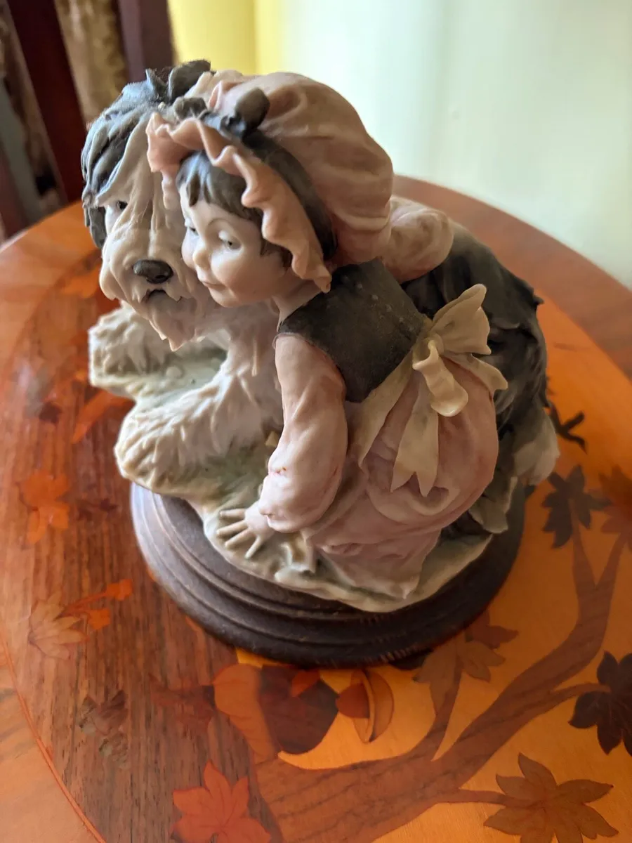 Ornament of sheepdog and young girl. - Image 1