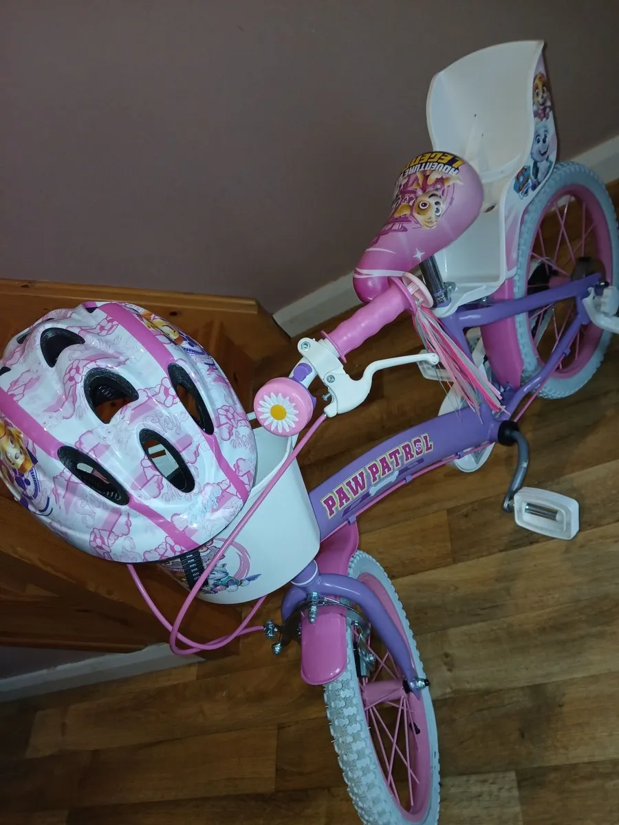 16 inch paw patrol bike and Helmet - Image 1