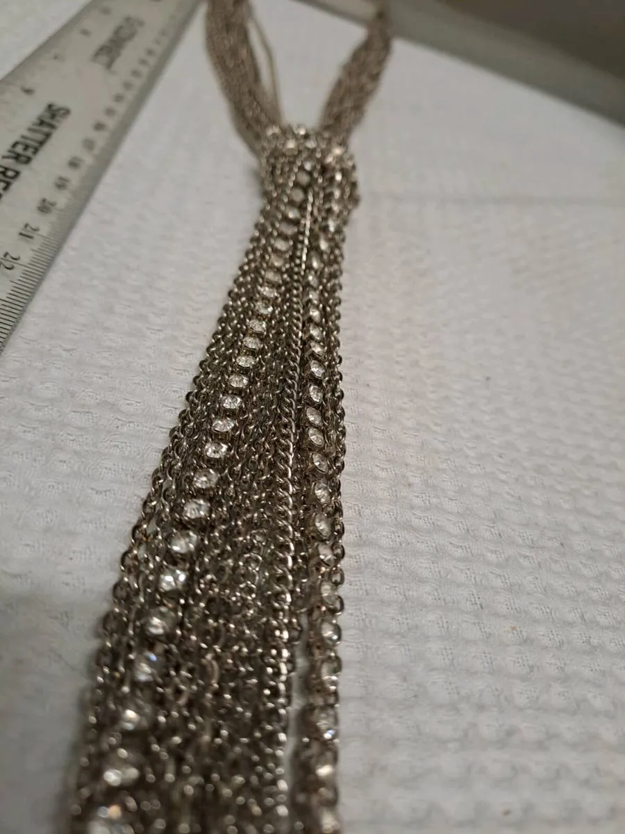 Silver Tone Multi-Chain Tassel Statement Necklace - Image 4