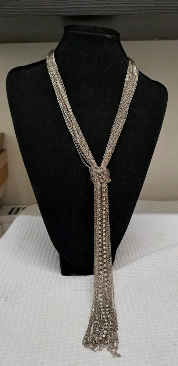 Silver Tone Multi-Chain Tassel Statement Necklace - Image 1