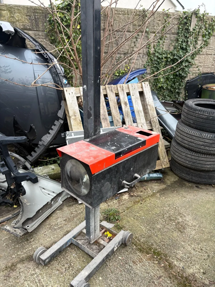 Head light beam setter