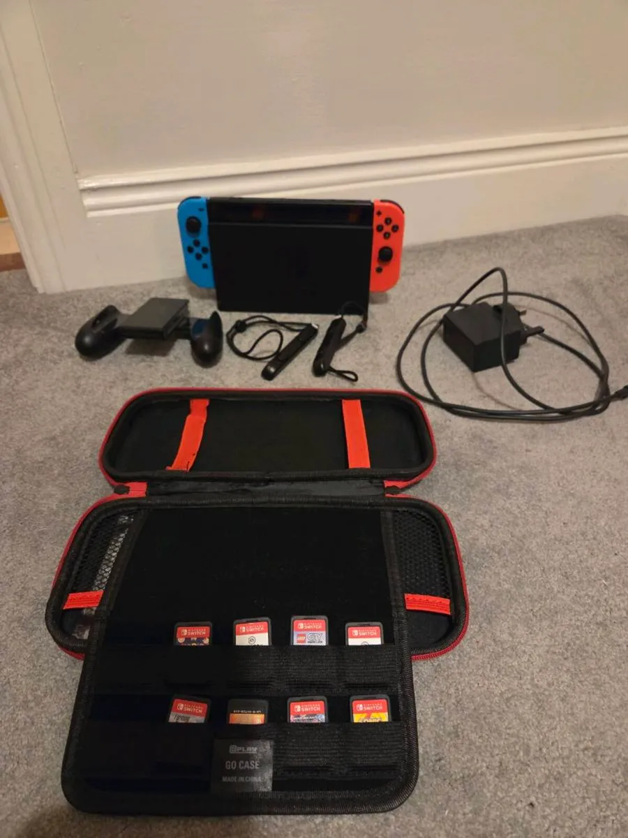 Nintendo Switch + Games + Accessories - Image 1
