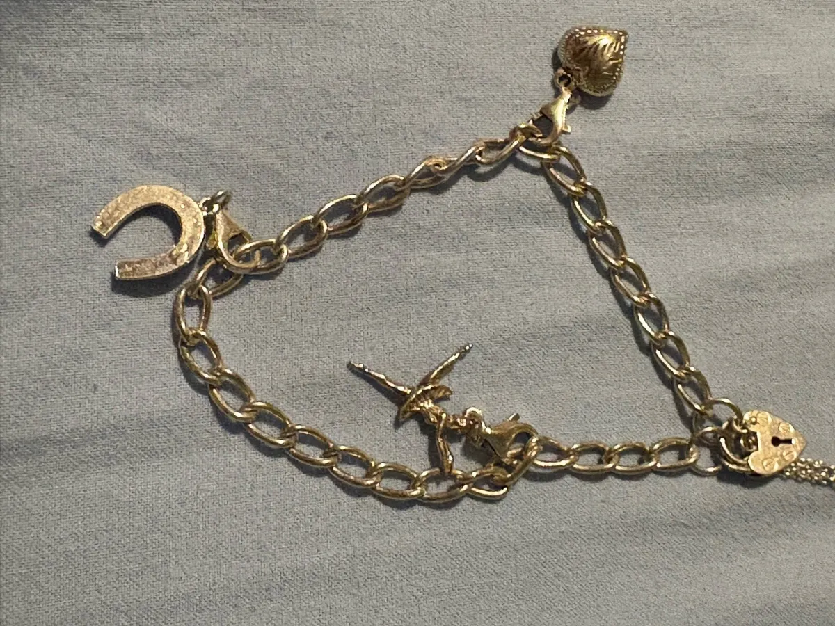 Silver charm bracelet - Image 1