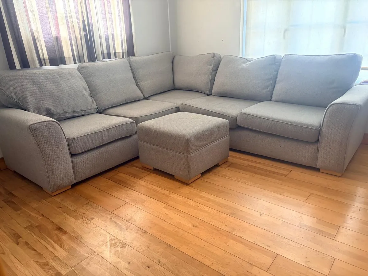 L-shaped Grey colored corner sofa - Image 1