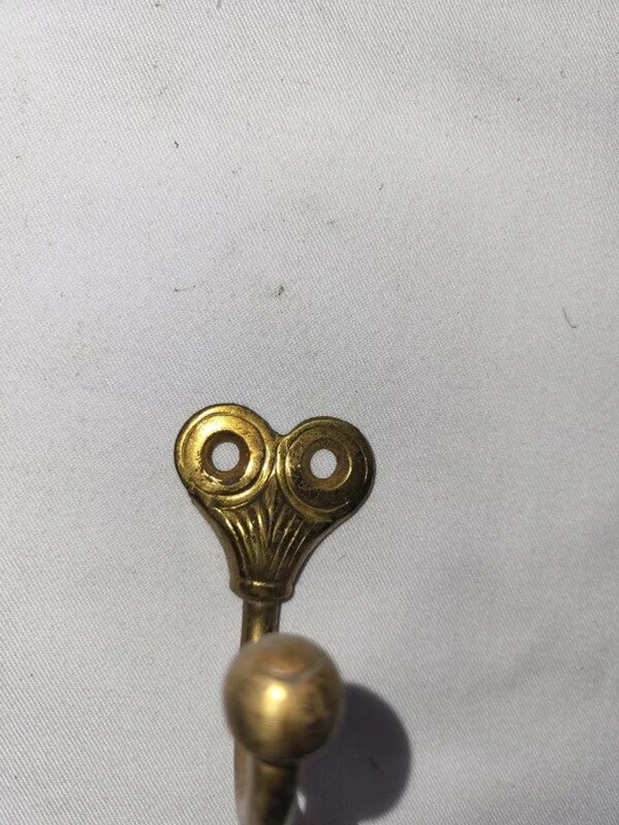 Patient brass coat hangers - Image 1