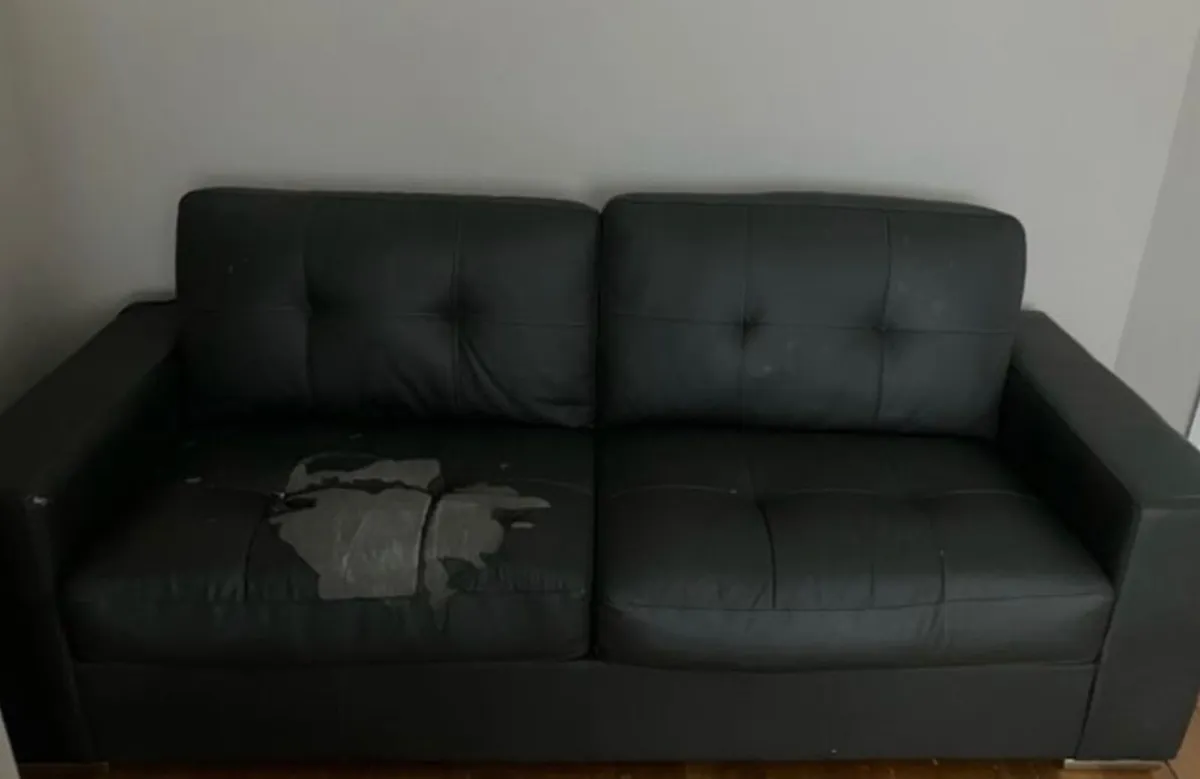 FREE black three seater leather couch
