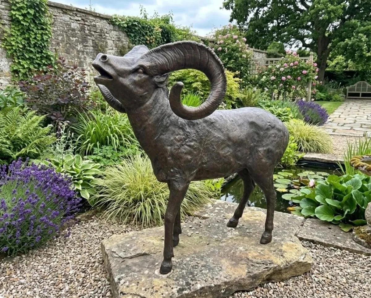 Bronze king puck goat sculpture