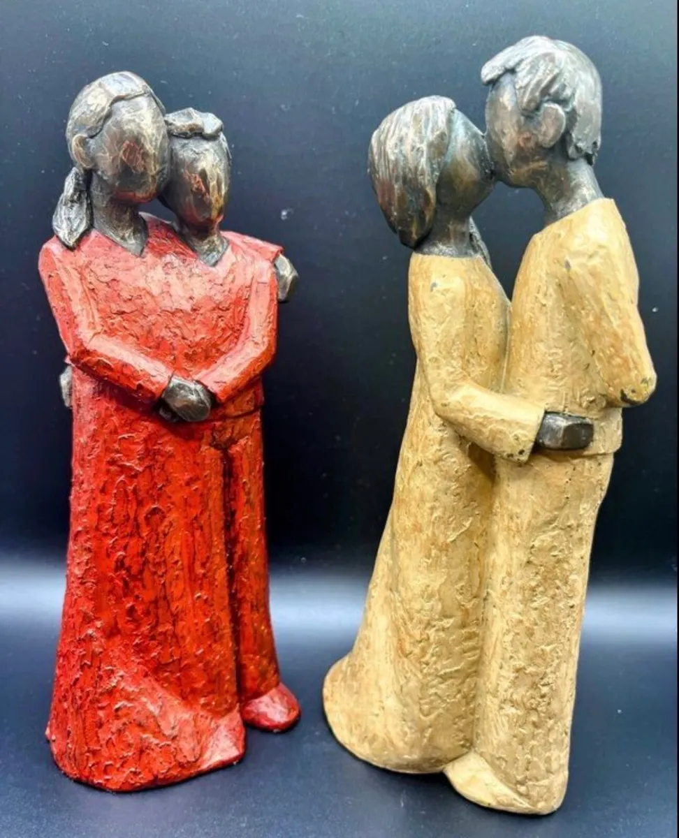 Genesis figurines pair