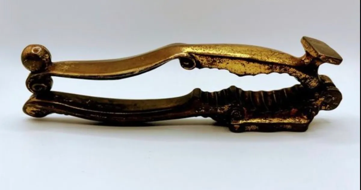 Antique brass nutcracker