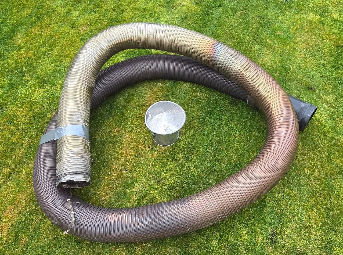 Stove flue liner with chimney cap and vermiculite - Image 1