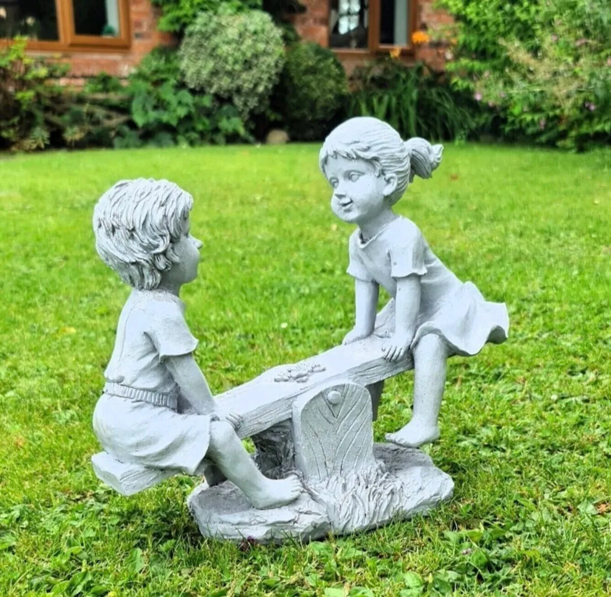 Boy and Girl Seesaw Garden Ornament NEW - Image 1