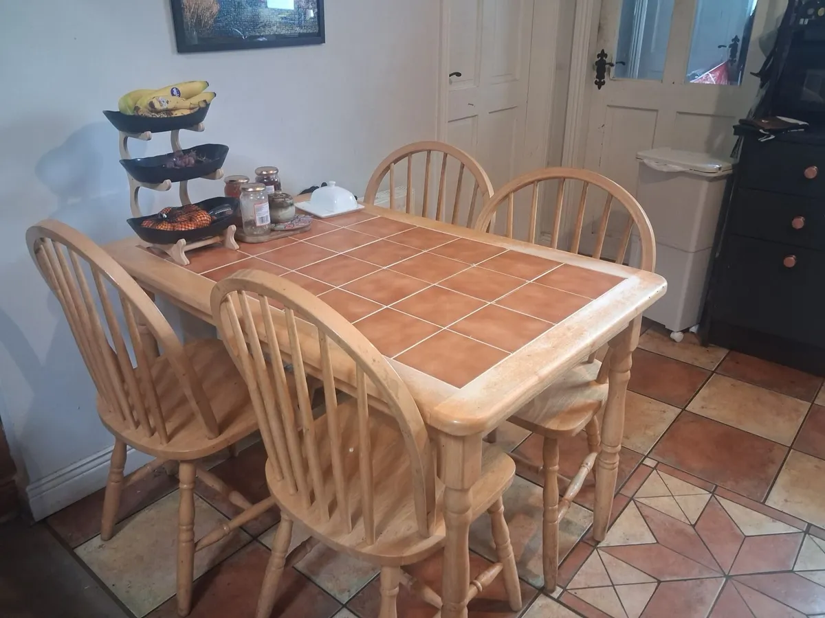 Tiled kitchen table and four chairs for sale - Image 1