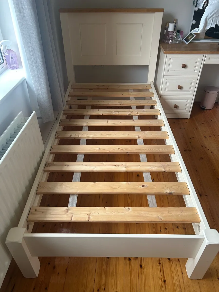 Cream wooden single beds x2 - Image 1