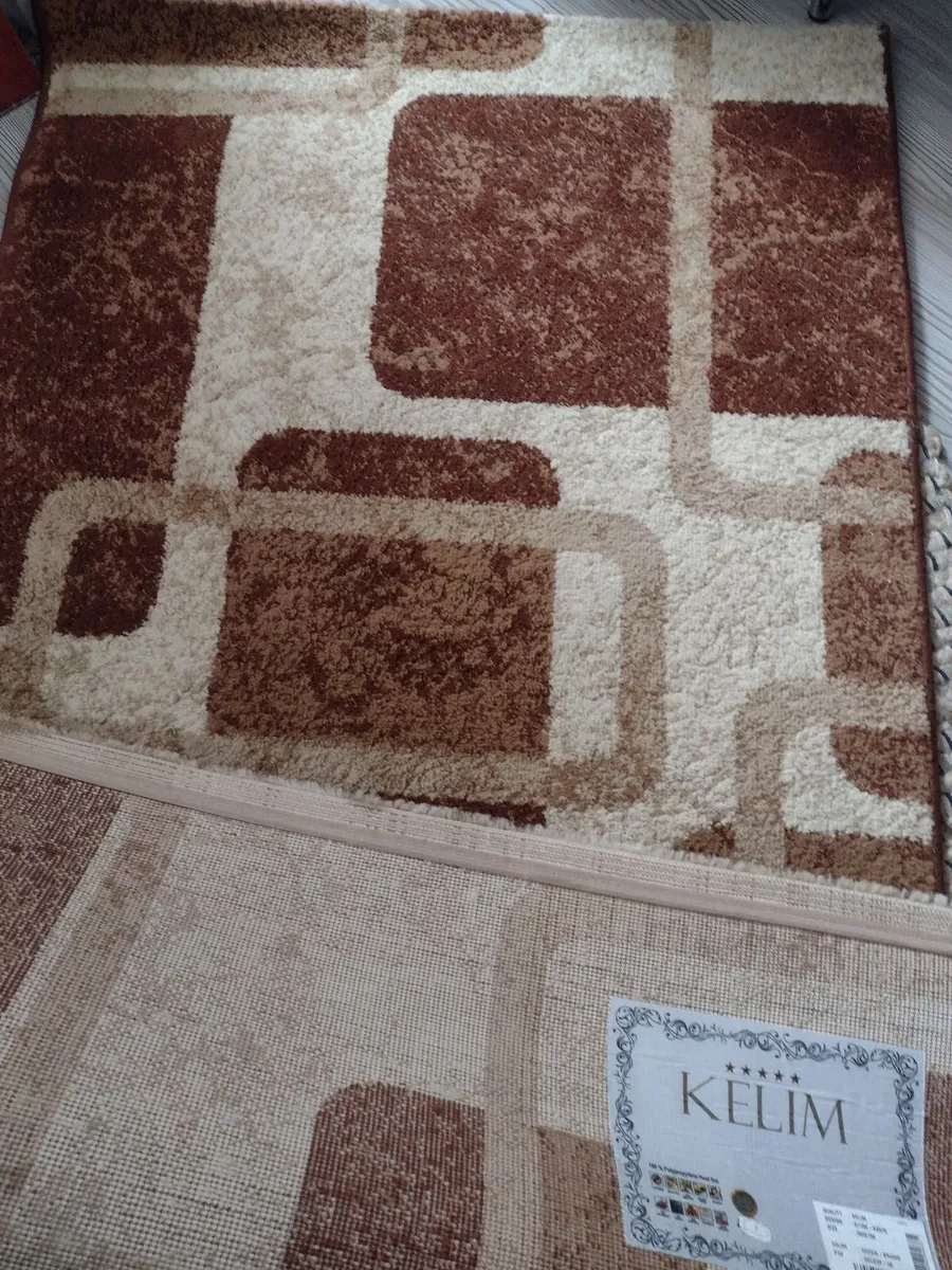 Clean beige/brown pattern rug - Image 1