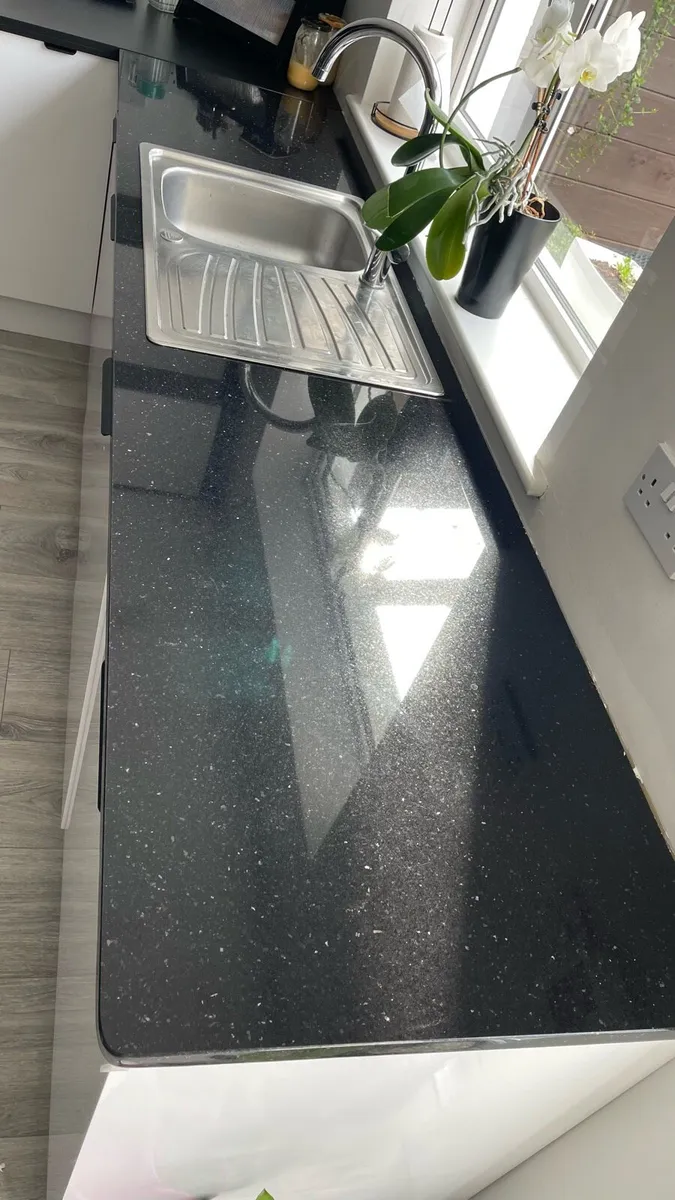 Black granite kitchen countertop - Image 1