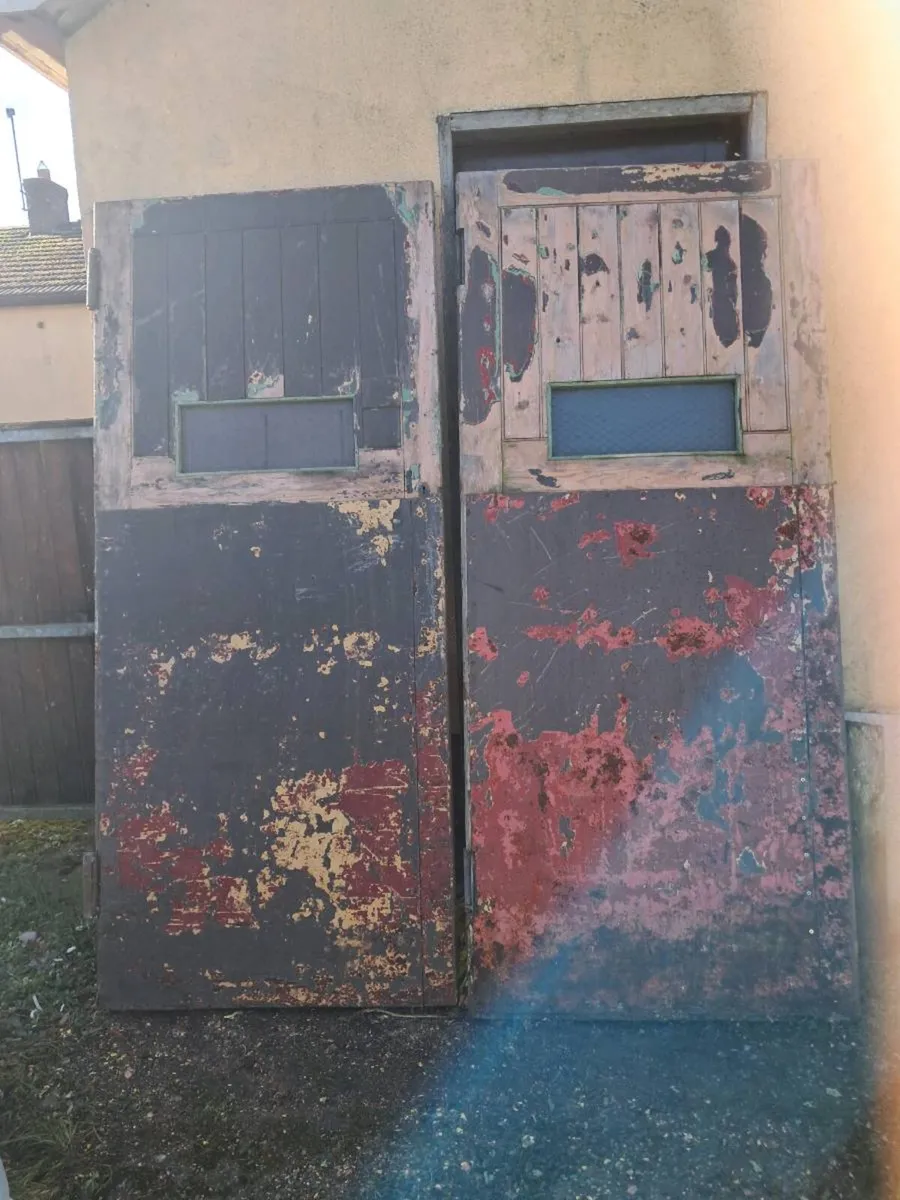 2 steel bound and timber prison doors - Image 1