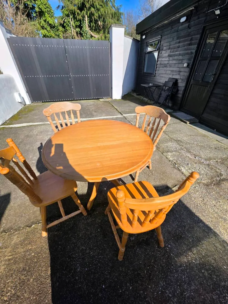 Dining table and four chairs - Image 1