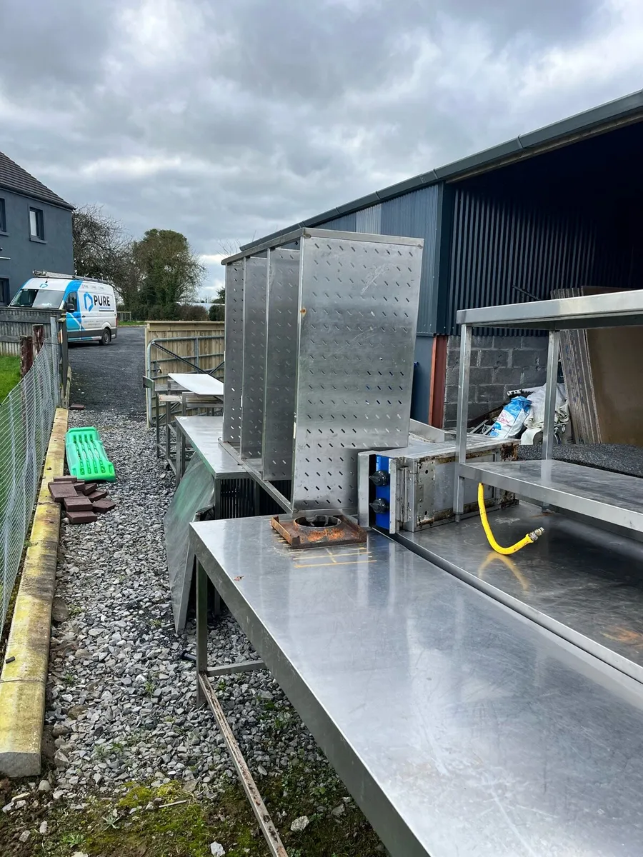 Selection of stainless steel tables - Image 1