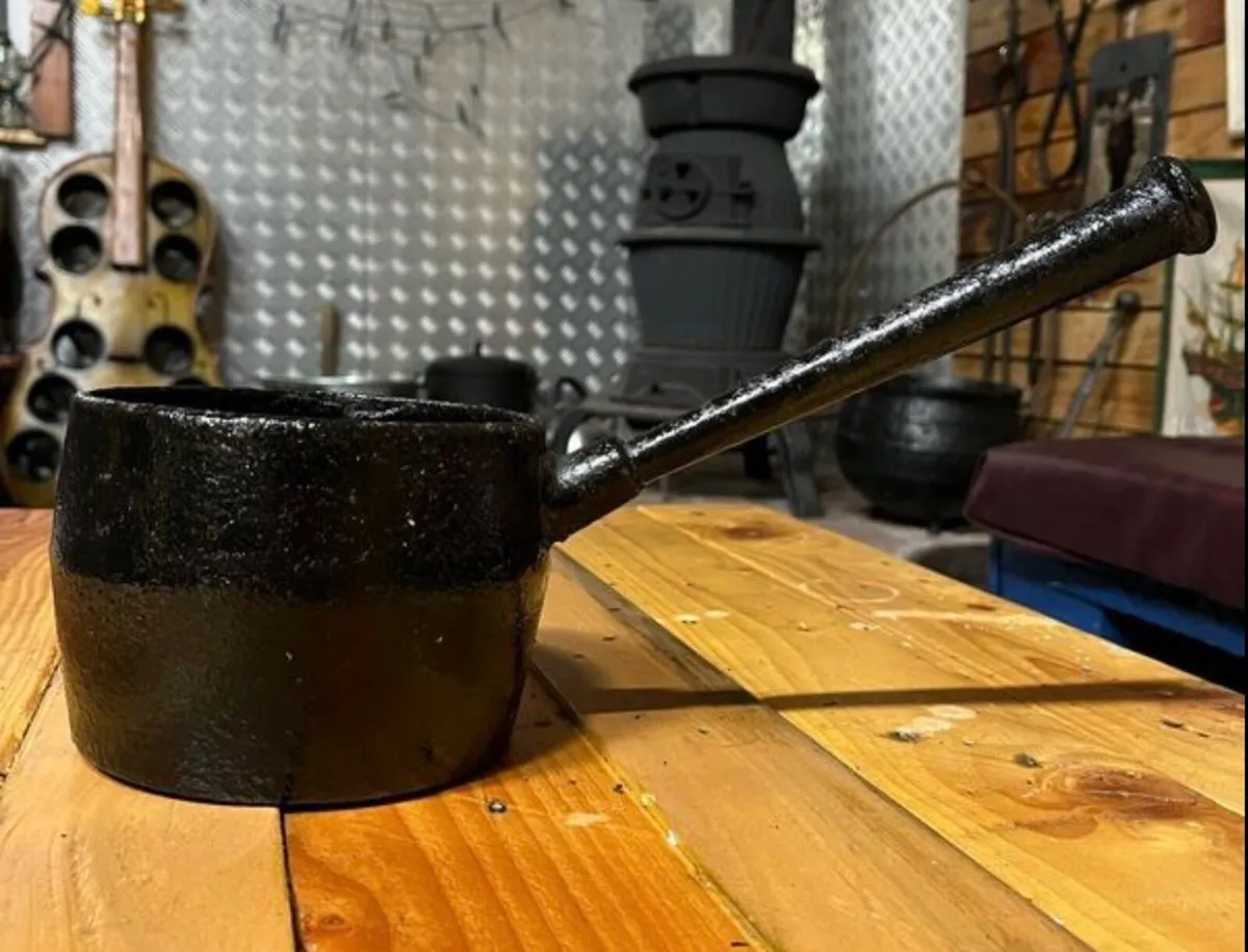 Antique long handled cast iron gypsy pot