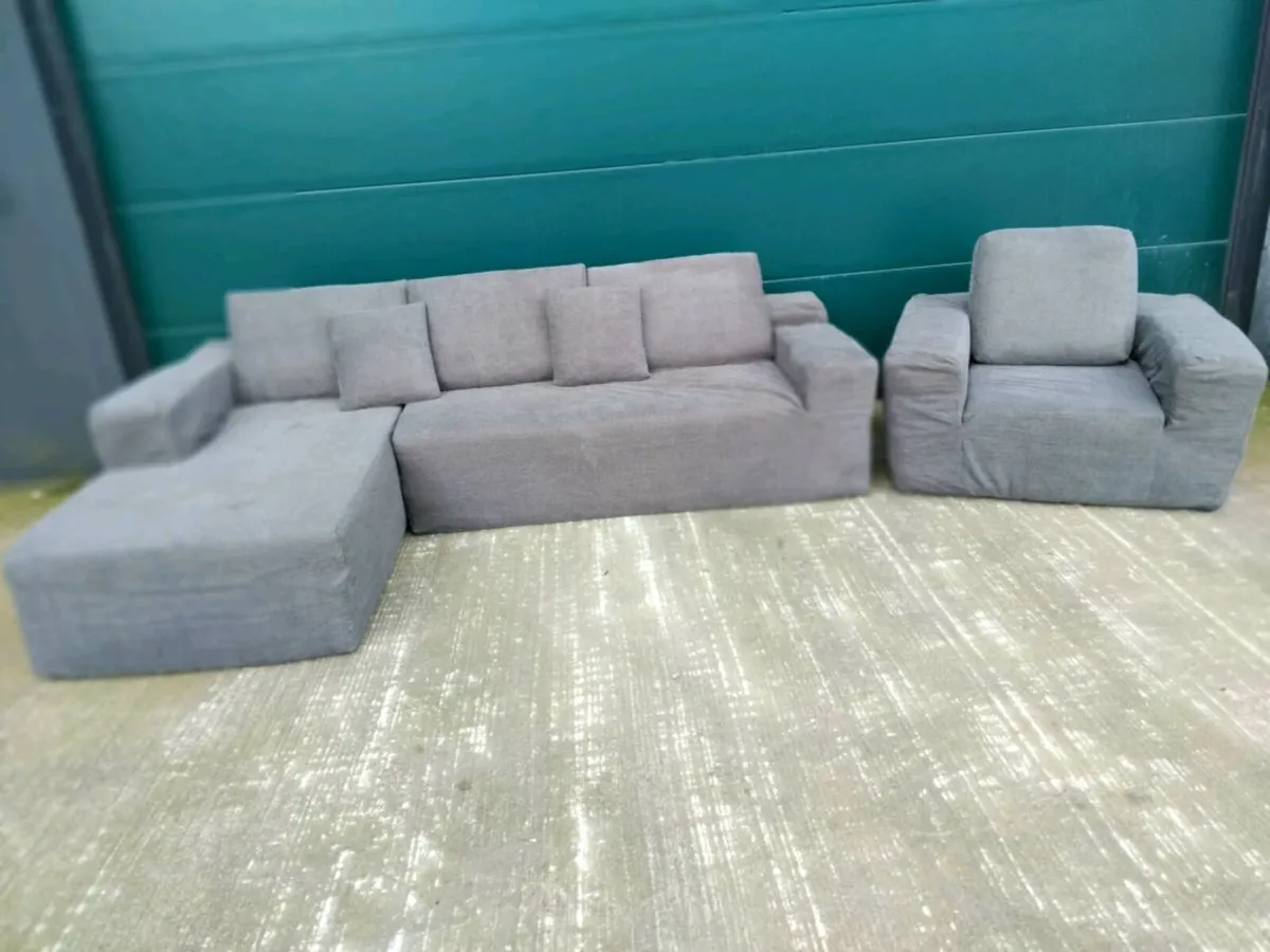 Gray corner sofa and matching chair brand new