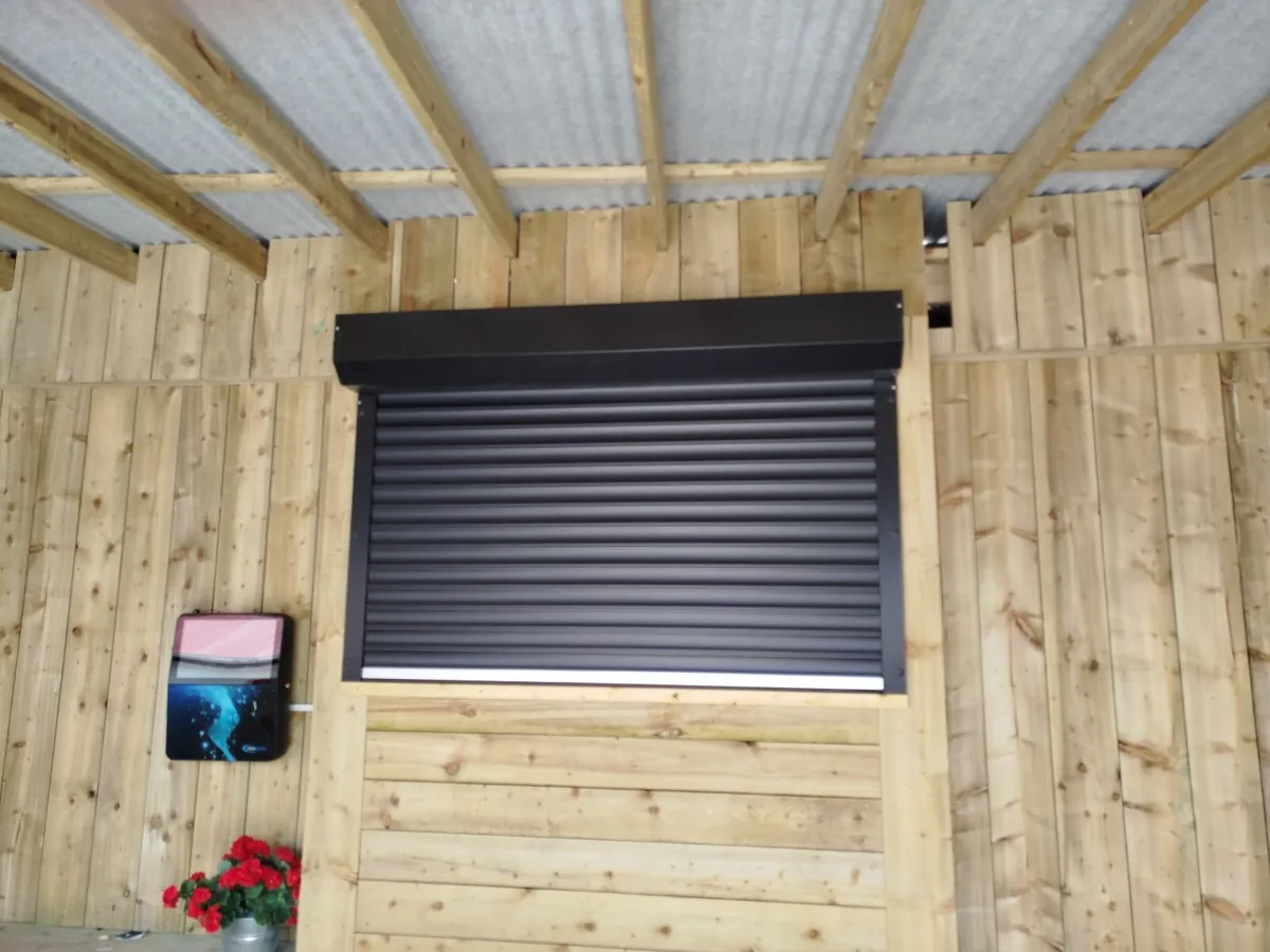 insulated  roller  door,  new,  full  auto - Image 1