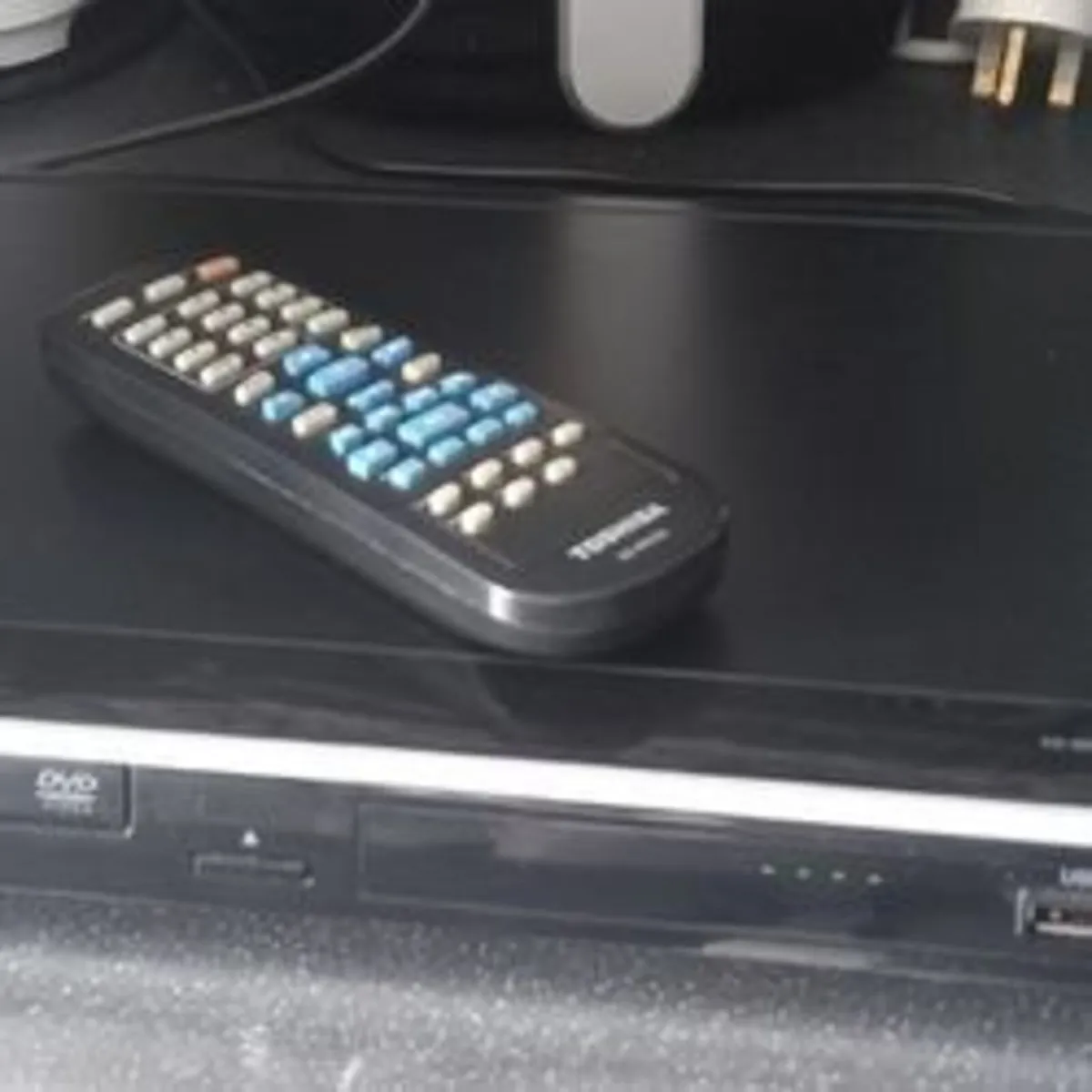 Toshiba DVD/CD/USB Player with remote & DVD's - Image 1