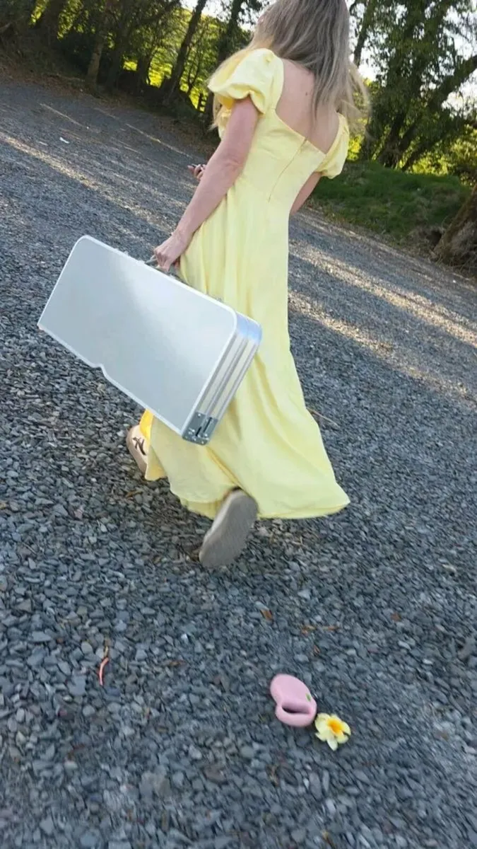 Foldable camping table with four seats. - Image 1