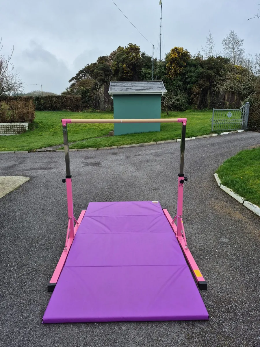 Gymnastics Bar & Mat - Image 1