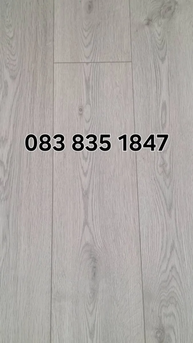 7mm Grey Malaga laminated flooring supply&fit - Image 1