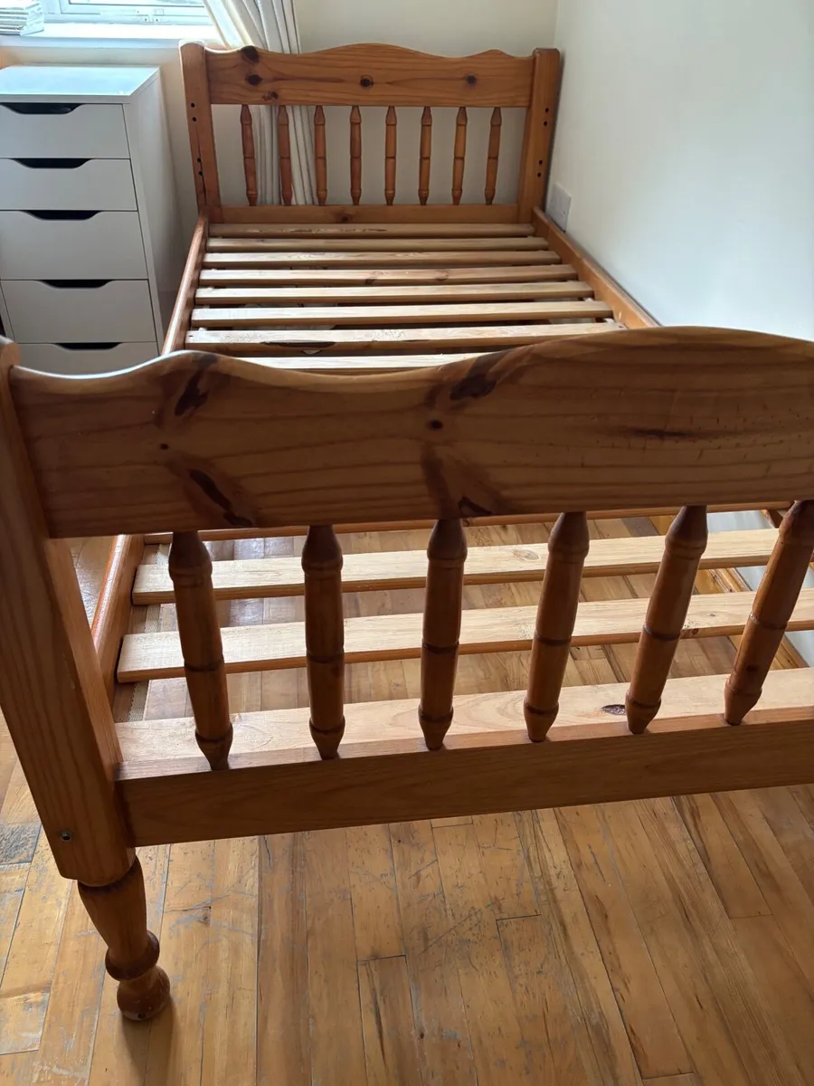 Pair of identical single wooden bed frames - Image 1