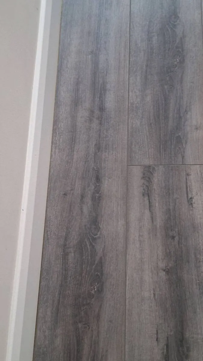 7mm malaga grey laminated flooring supply&fit - Image 3