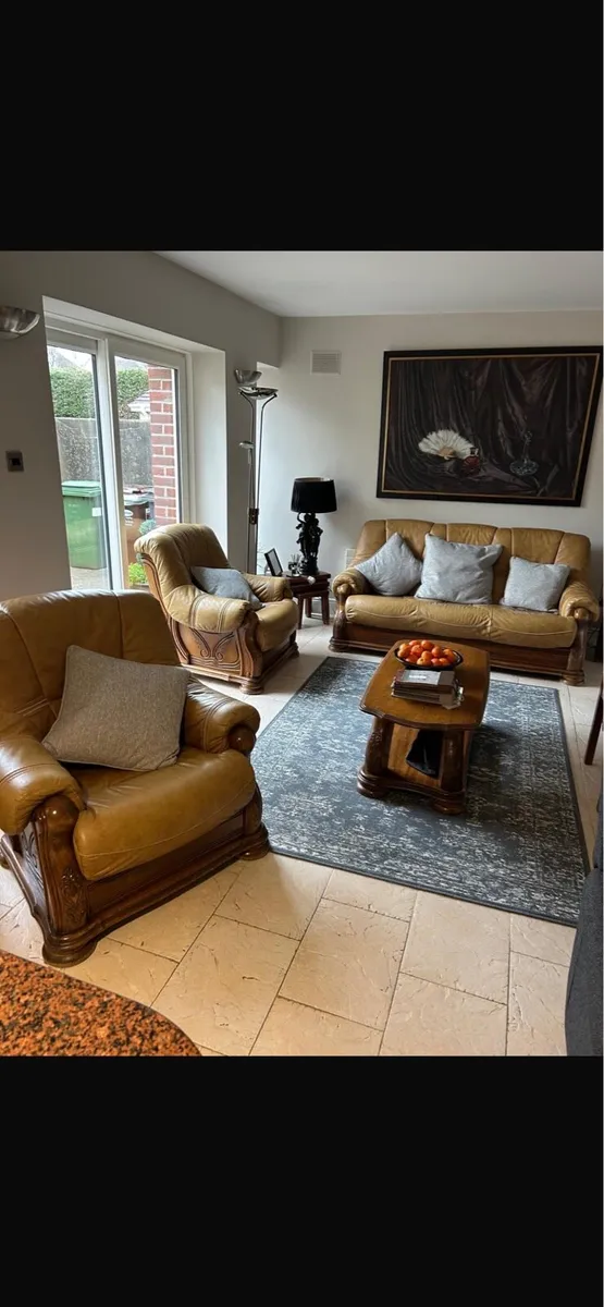 Traditional style leather sofas and two armchairs. - Image 1