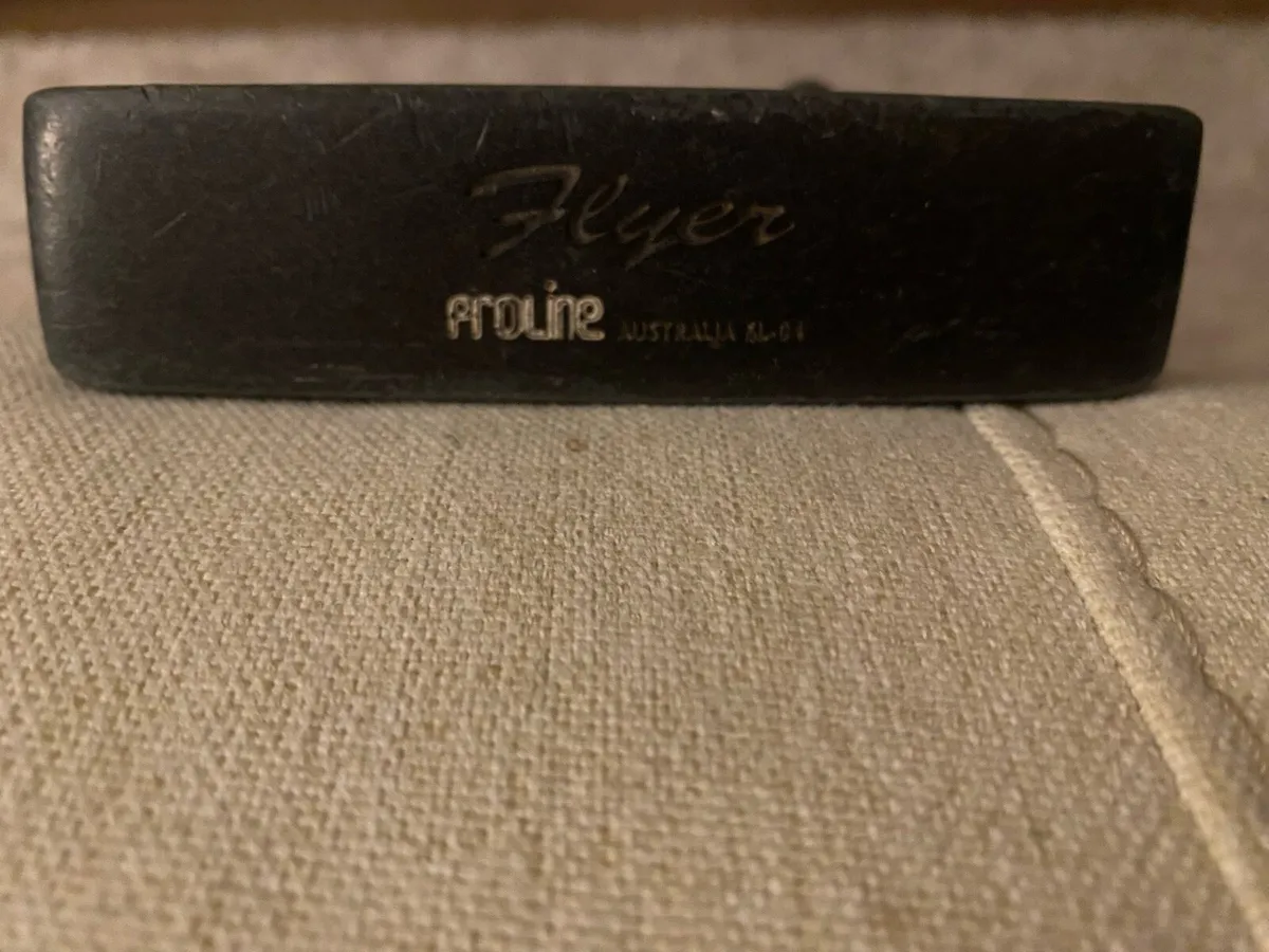 Various golf clubs and putters - Image 1