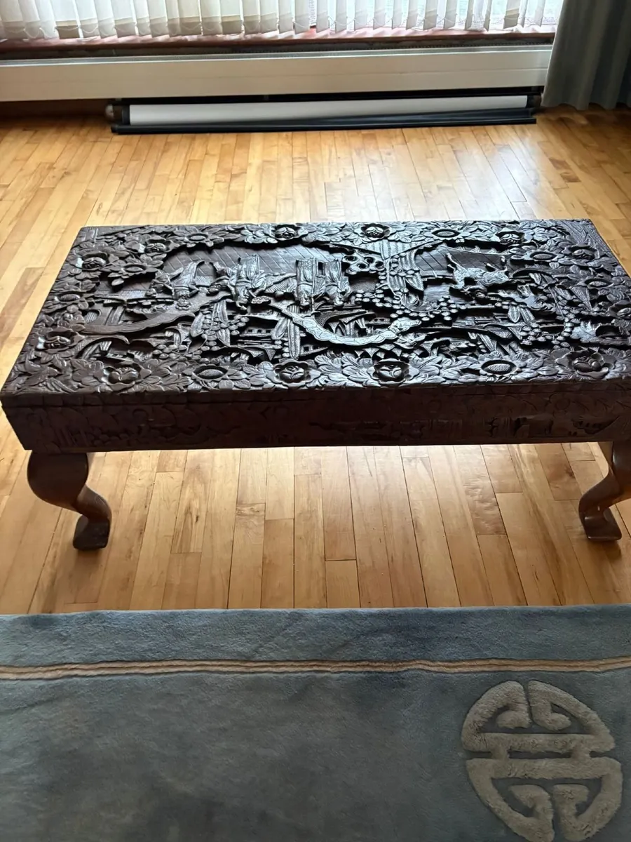 Hand carved wooden table