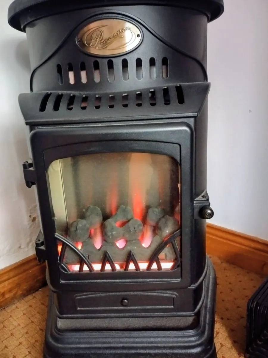Cast iron gas heater with tank - Image 1