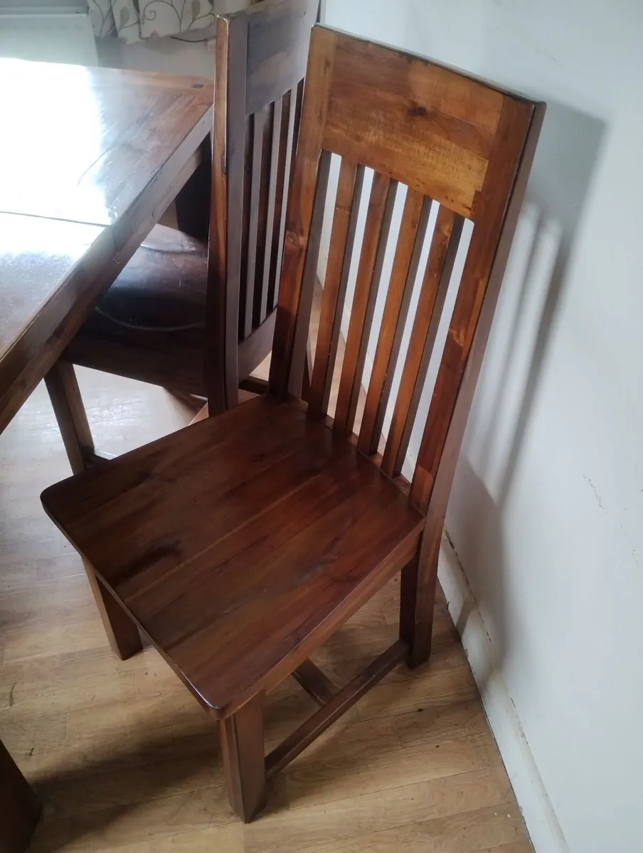 Extending kitchen table with four chairs - Image 1