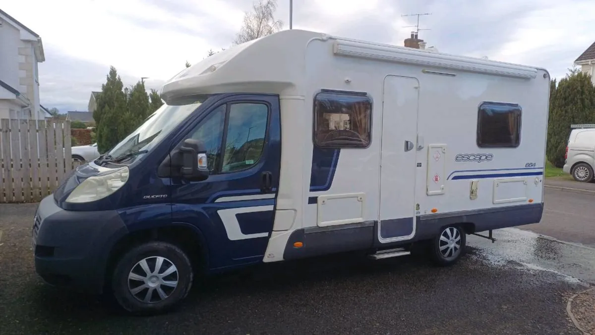 NI reg Swift Escape 664 Fixed Bed - Image 1