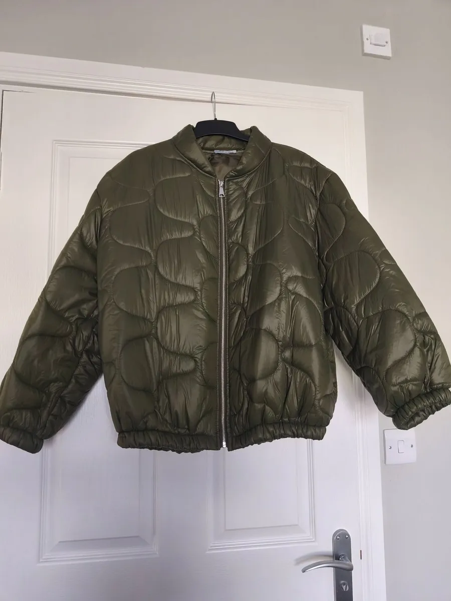 Coat one size fits up to XL NEW