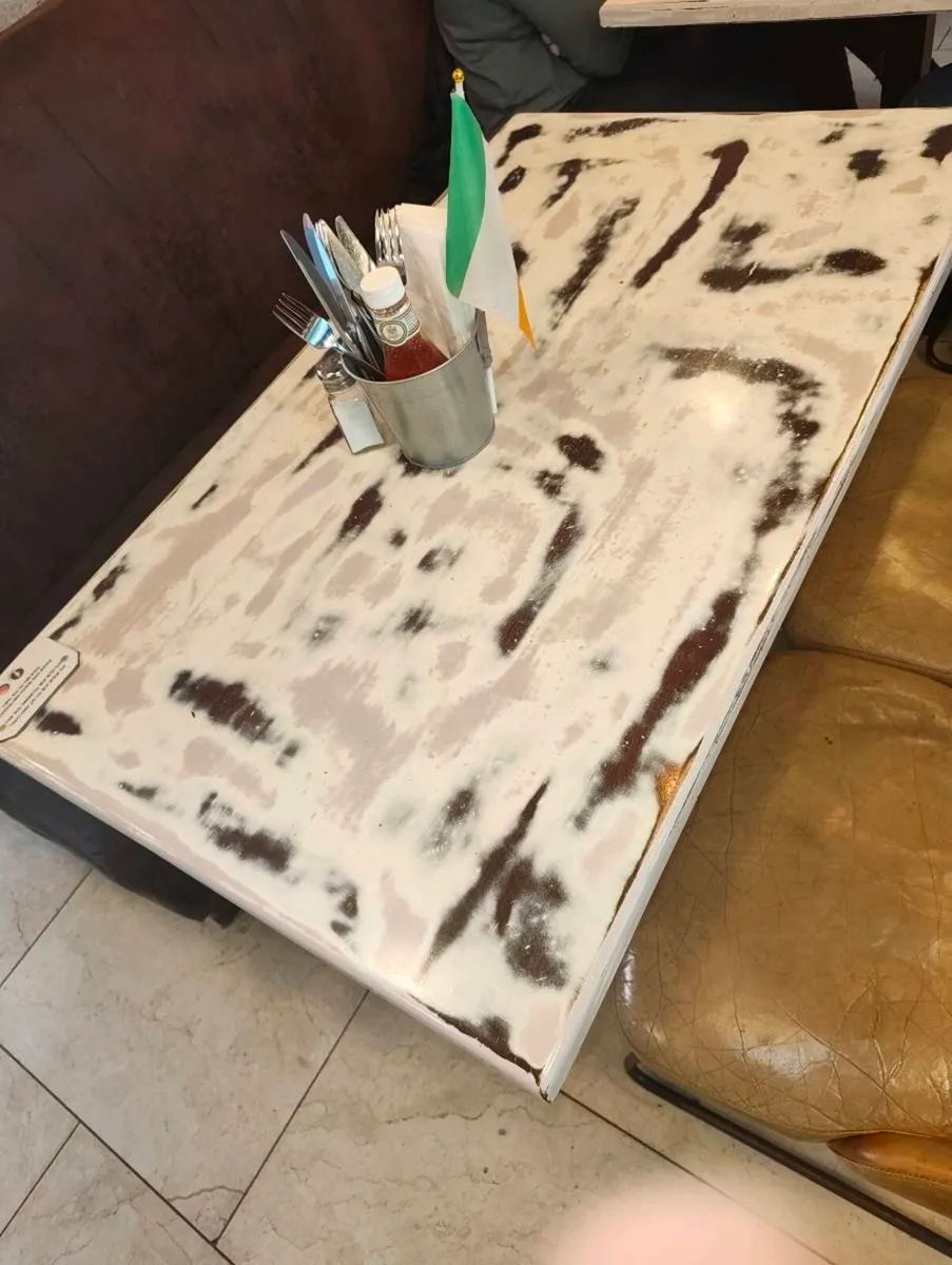 Table tops and leather couches. - Image 1