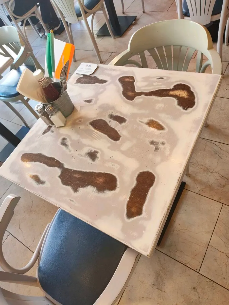 Table tops and leather couches. - Image 2