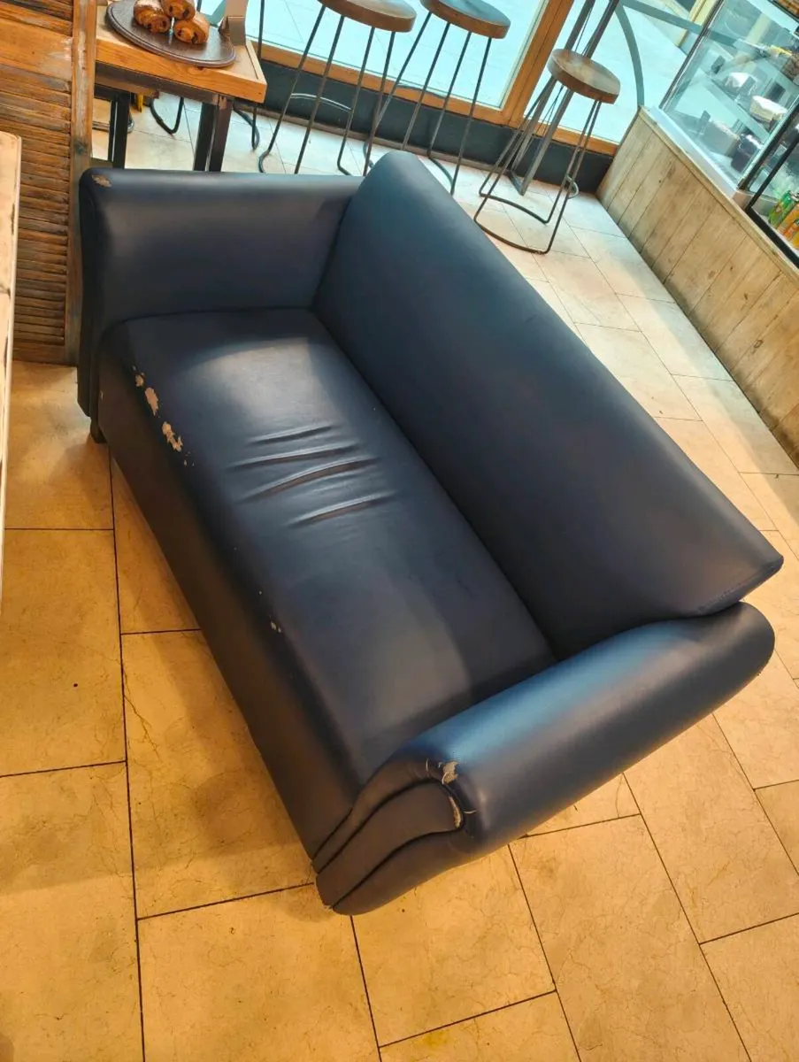 Table tops and leather couches. - Image 3