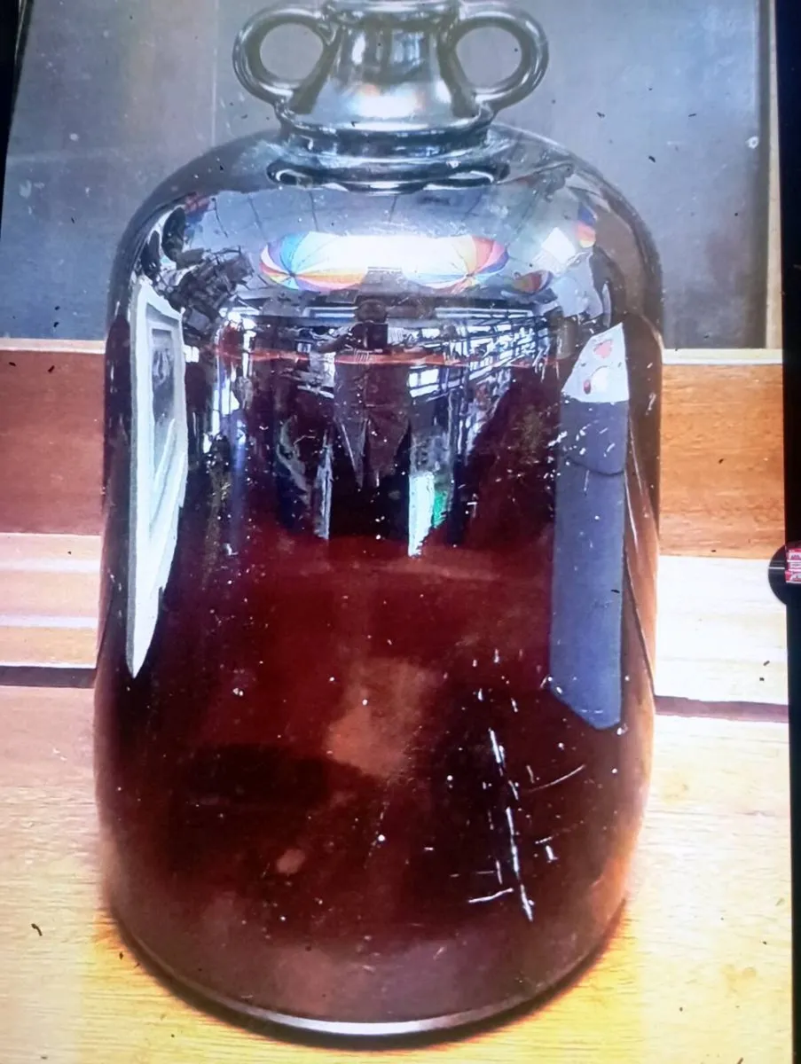 VINTAGE DARK AMBER GLASS DEMIJOHN BOTTLE