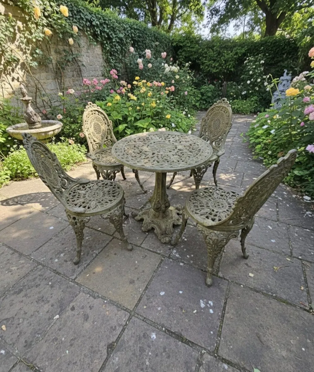 Cast iron French table and chairs - Image 1