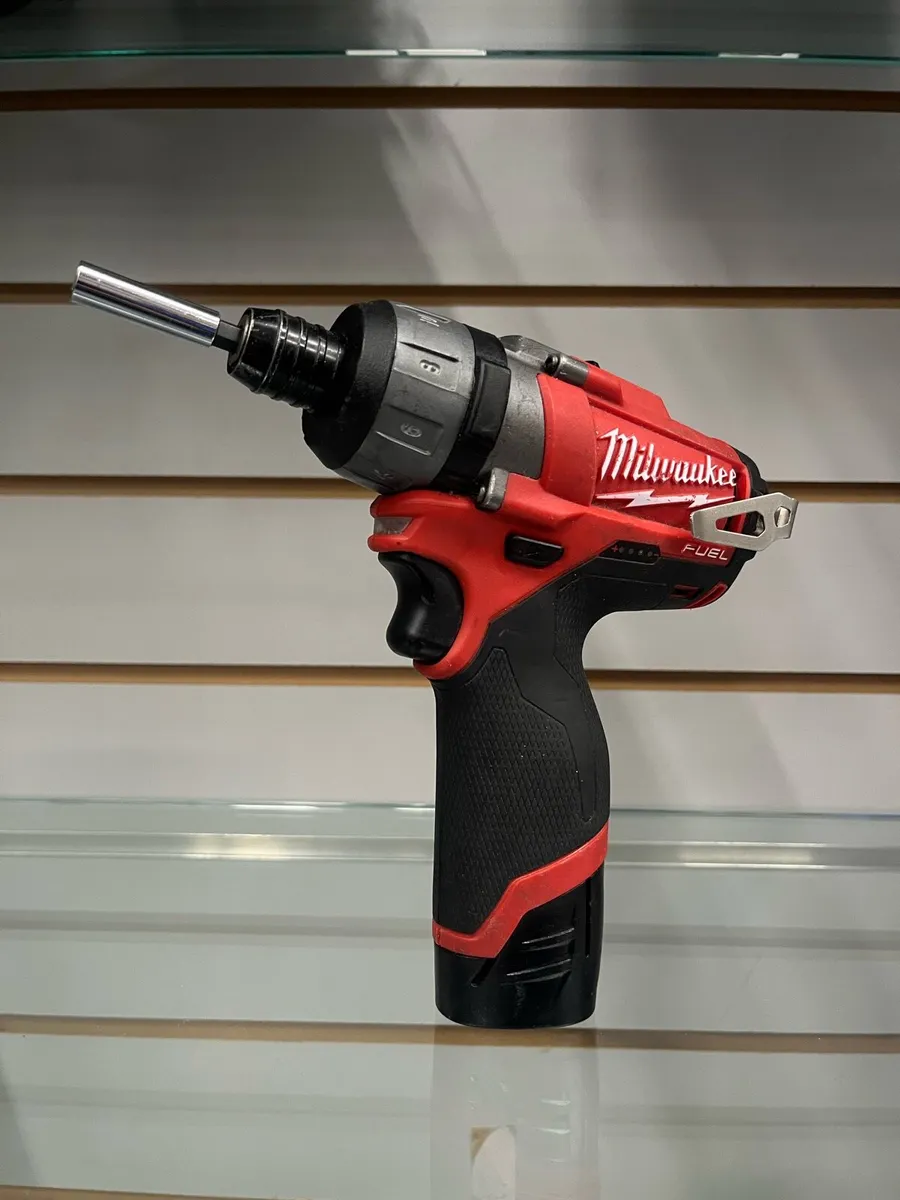 Milwaukee M12 RedLithium Drill +2.0Ah Battery - Image 1