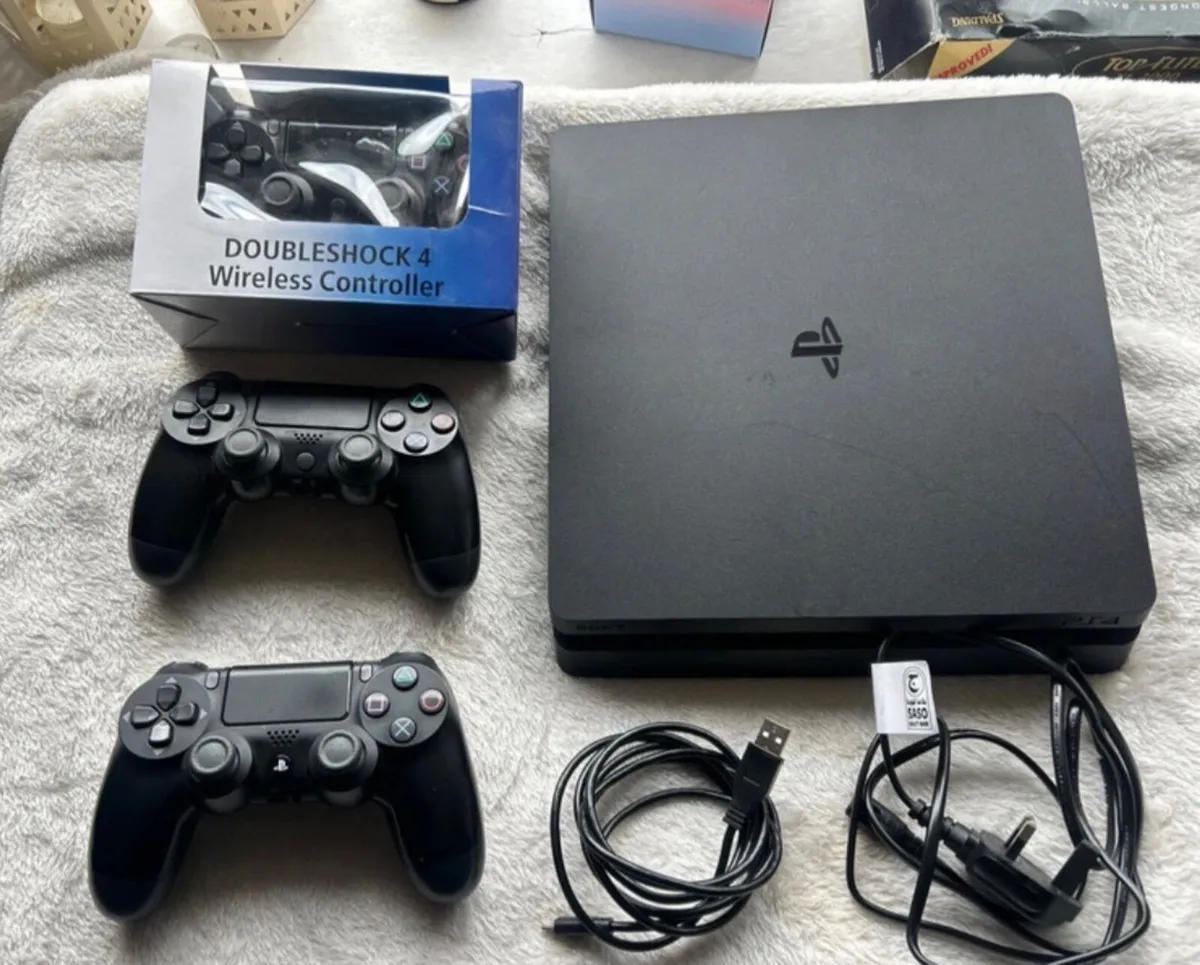 PlayStation 4 Slim and 3 controllers - Image 1