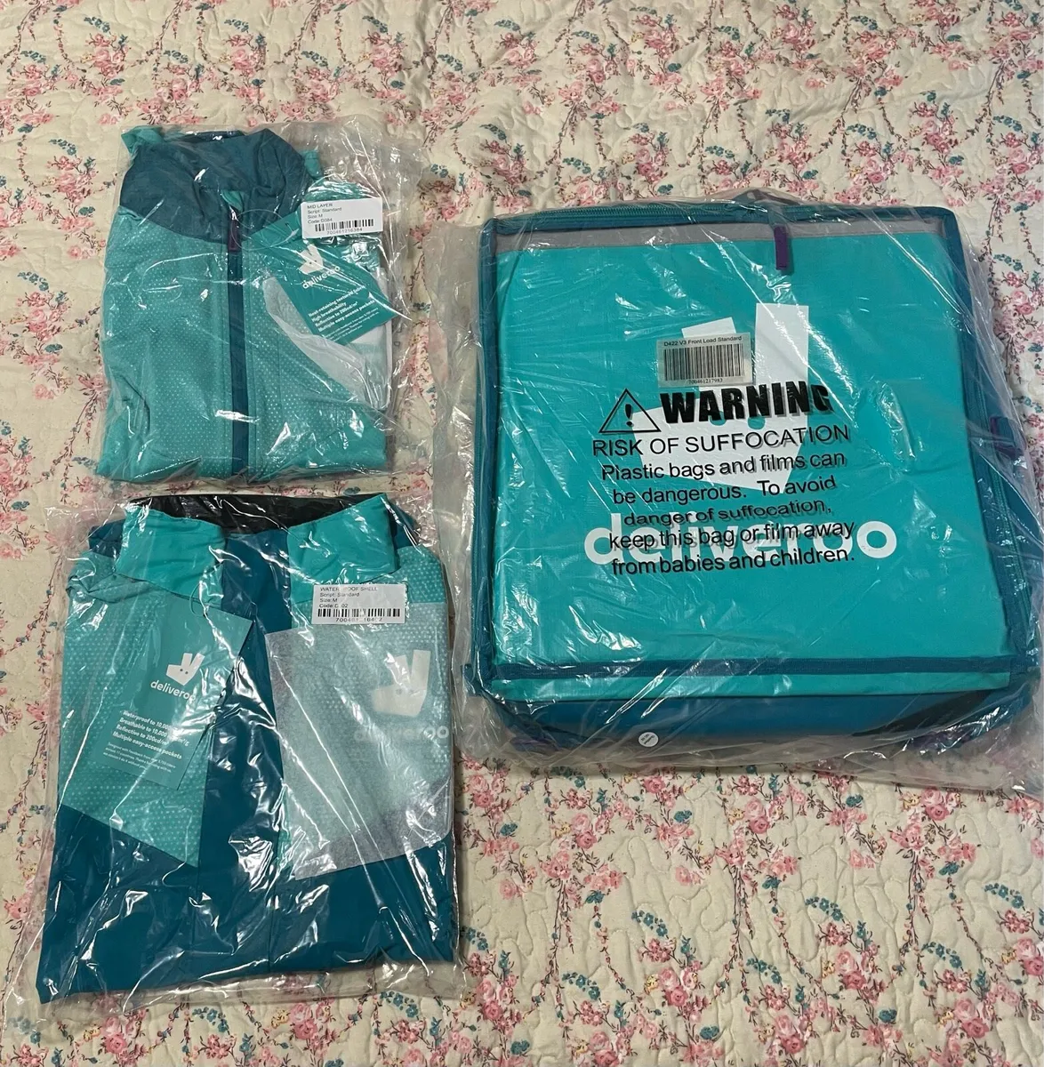 Deliveroo kit delivery bag, jacket and mid layer
