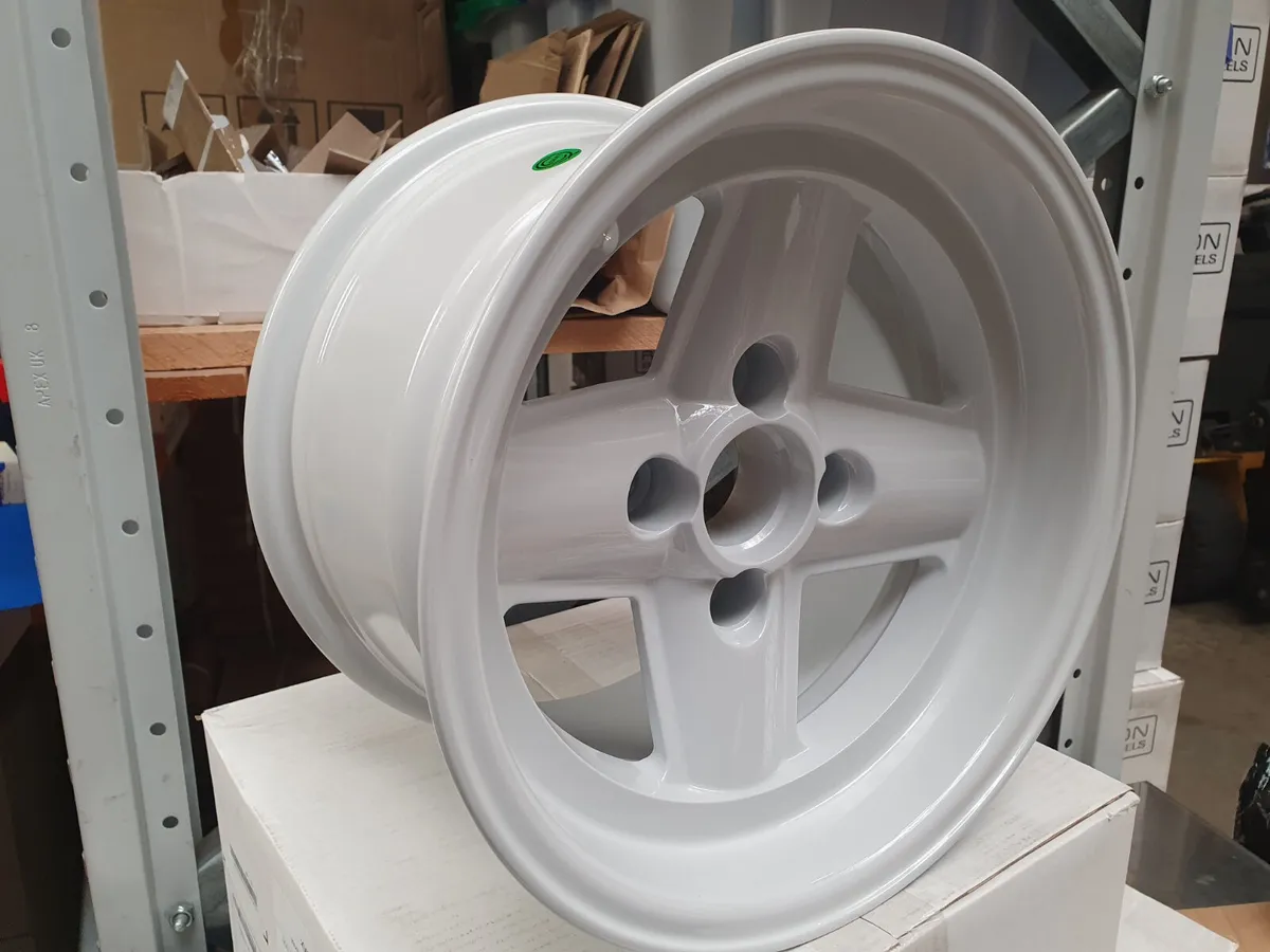 NEW 8x13 White 4 spoke 4/100 - Image 1