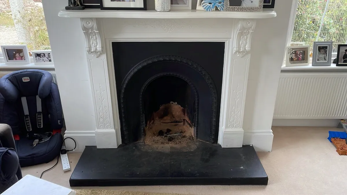 Cast iron surround and mantle
